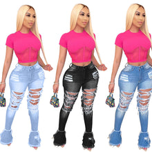 Jeans w/ fringed holes